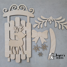 Load image into Gallery viewer, Sled with Reindeer doorhanger