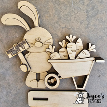 Load image into Gallery viewer, loppy Easter Bunny Shelf Sitter with Wheelbarrow | 7x7.5" Spring Wood Decor