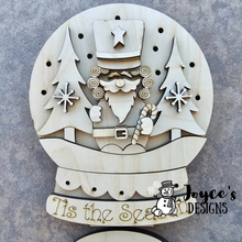 Load image into Gallery viewer, Tis the Season Nutcracker Snowglobe Shelf Sitter | 6.5" x 8" Wood Blank with 10 Holes for Fairy Lights | DIY Christmas Decor