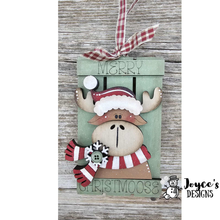 Load image into Gallery viewer, Santa hat on moose on sleigh ornament