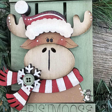 Load image into Gallery viewer, Santa hat on moose on sleigh ornament