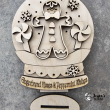 Load image into Gallery viewer, Gingerbread Kisses Lighted Shelf Sitter Snow Globe – DIY Wooden Christmas Decor (6x7.5)
