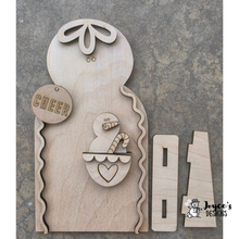 Load image into Gallery viewer, Gingerbread Pocket Snowman Cheer Tag | 5.5x10.25 Unfinished Wooden Door Hanger | DIY Christmas Paint Kit

