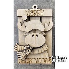 Load image into Gallery viewer, Santa hat on moose on sleigh ornament
