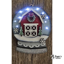 Load image into Gallery viewer, Farmhouse Barn Light-Up Snow Globe Ornament “Merry Christmas” — Fairy Light Compatible
